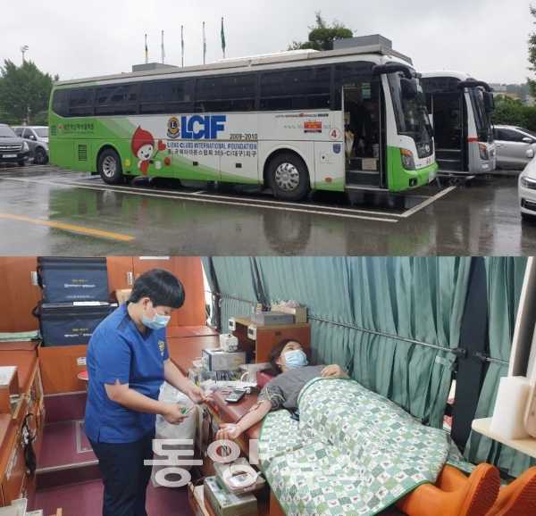 지난 22일 경산시청에서 열린 '사랑의 헌혈운동' 헌혈버스(위)와 헌혈 참여자.(사진=경산시보건소 제공)